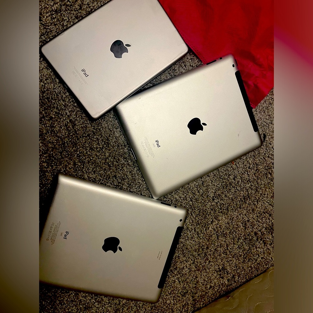 Three iPad  are  block for iCloud